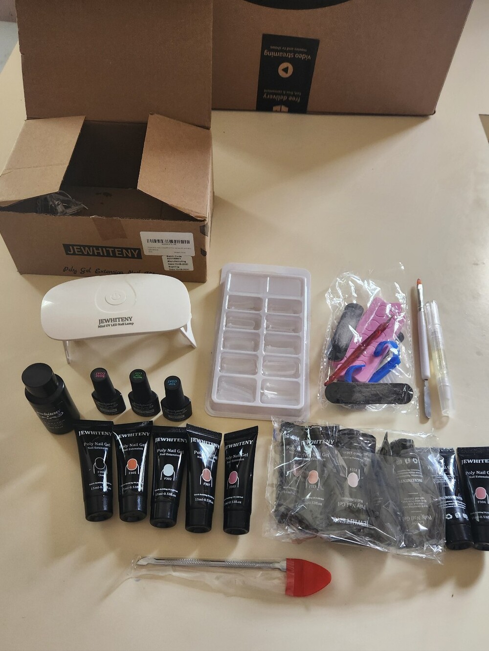 JEWHITENY Gel Nail Kit with Mini LED Lamp